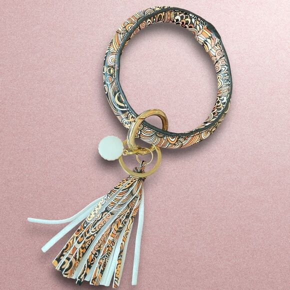 TRIBAL DESIGN BRACELET KEYRING WITH CHARM AND TASSEL - Picture 1 of 6